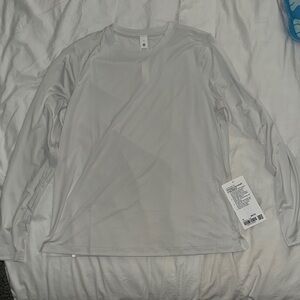 Lulu Lemon ultralight hip length, long sleeve shirt